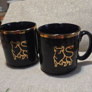 TAMS Made In England. TWO Black and Gold Bull Design Mugs